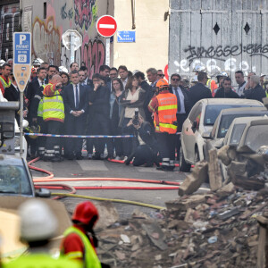 Gérald Darmanin, ministre de l'Intérieur, est arrivé à Marseille pour constater les dégâts à la suite de l'effondrement d'un immeubles en centre ville. Le 9 avril 2023. Dans la nuit de ce dimanche, un immeuble d’habitation s’est effondré à Marseille faisant, selon un bilan provisoire, au moins cinq blessés. Entre quatre et une dizaine de personnes pourraient être sous les décombres de l’immeuble qui s’est effondré dans la nuit dans le centre de Marseille et où un feu violent empêche les recherches. Quatre personnes y sont de façon « certaine » et « une dizaine pourrait être là », a déclaré le ministre, venu dans la deuxième ville de France soutenir les habitants et la centaine de pompiers à pied d’œuvre. © JR Santini / Bestimage  Gérald Darmanin, Minister of the Interior, arrived in Marseille to see the damage following the collapse of two buildings in the city centre. April 9, 2023. During the night of Sunday, an apartment building collapsed in Marseille, leaving at least five people injured, according to a provisional report. Between four and ten people could be under the rubble of the building that collapsed during the night in the centre of Marseille and where a violent fire is preventing searches. Four people are "certain" and "a dozen could be there," said the minister, who came to France's second city to support the residents and the hundred or so firefighters working on the site. 