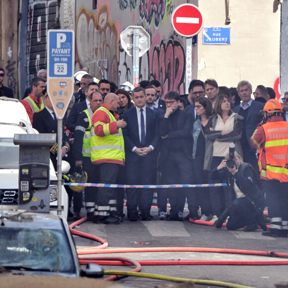 Gérald Darmanin, ministre de l'Intérieur, est arrivé à Marseille pour constater les dégâts à la suite de l'effondrement d'un immeubles en centre ville. Le 9 avril 2023. Dans la nuit de ce dimanche, un immeuble d’habitation s’est effondré à Marseille faisant, selon un bilan provisoire, au moins cinq blessés. Entre quatre et une dizaine de personnes pourraient être sous les décombres de l’immeuble qui s’est effondré dans la nuit dans le centre de Marseille et où un feu violent empêche les recherches. Quatre personnes y sont de façon « certaine » et « une dizaine pourrait être là », a déclaré le ministre, venu dans la deuxième ville de France soutenir les habitants et la centaine de pompiers à pied d’œuvre. © JR Santini / Bestimage  Gérald Darmanin, Minister of the Interior, arrived in Marseille to see the damage following the collapse of two buildings in the city centre. April 9, 2023. During the night of Sunday, an apartment building collapsed in Marseille, leaving at least five people injured, according to a provisional report. Between four and ten people could be under the rubble of the building that collapsed during the night in the centre of Marseille and where a violent fire is preventing searches. Four people are "certain" and "a dozen could be there," said the minister, who came to France's second city to support the residents and the hundred or so firefighters working on the site. 