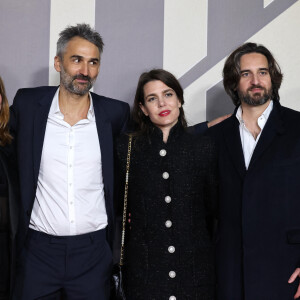 Exclusif - Martin Bourboulon et sa femme, Charlotte Casiraghi et Dimitri Rassam - Photocall de l'avant-première du film "Les Trois Mousquetaires : D'Artagnan" aux Invalides à Paris le 21 mars 2023. © Jacovides / Moreau / Guirec / Bestimage 