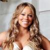 Mariah Carey, elle, préfère mettre les deux mains sur ses hanches... Un technique de la diva pour affiner sa silhouette ! Quand on est une star on l'est jusqu'au bout !