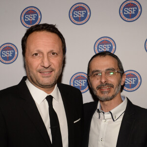 Exclusif - Arthur (Jacques Essebag) et Arié Lévy (président de l'association Sauveteurs Sans Frontières) - Dîner de gala et vente aux enchère pour l'association "Sauveteurs sans frontières" ("Qui sauve une vie sauve l'humanité") à l'hôtel du collectionneur à Paris, France, le 13 février 2018. G.Elmaleh, Arthur (J.Essebag), A.Abittan et C.Hanouna ont animés la soirée et ont pris très à coeur leurs rôles de "commissaires priseurs" pour une vente aux enchères mémorable pour l'association Sauveuteurs Sans Frontières. G.Elmaleh, Arthur (J.Essebag), A.Abittan et C.Hanouna ont achétés 10 kits de survie SSF chacun. Sauveteurs Sans Frontières est une Organisation Non Gouvernementale franco-israélienne d'aide médicale internationale, agréée par le ministère de l'intérieur français. Forte de plusieurs antennes médicales mobiles et d'équipes de secouristes spécialisés, SSF- qui intervient sur le terrain selon les normes SAR (Search and Rescue: localisation et de secours aux personnes en situation de détresse). ONG qui compte plus de 6000 secouristes bénévoles (880 équipés), répartis sur 14 antennes internationales. © Rachid Bellak/Bestimage 