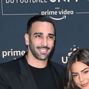 Adil Rami et sa compagne Léna Guillou - Photocall de la cérémonie des Trophées UNFP 2022 au Pavillon Gabriel à Paris le 15 mai 2022. © Coadic Guirec/Bestimage