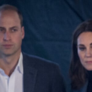 Le prince William, duc de Cambridge, Catherine (Kate) Middleton, duchesse de Cambridge, et le prince Harry assistent à la cérémonie de remise de diplômes des apprentis Coach Core au London Stadium. Londres, le 18 octobre 2017. 