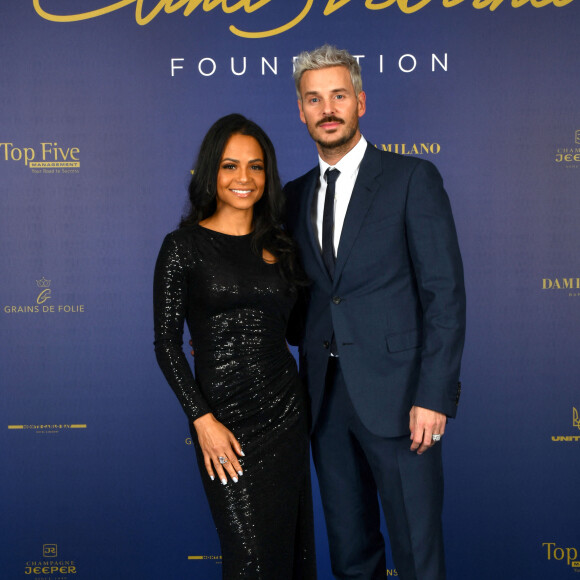 Exclusif - Christina Milian et son mari M. Pokora (Matt Pokora) - Photocall du gala annuel de la Fondation Elina Svitolina au Yacht Club de Monaco. Le 2 décembre 2022 © Bruno Bebert / Bestimage Le vendredi 2 décembre 2022, la Fondation Elina Svitolina a organisé une vente aux enchères lors de son dîner de gala annuel, qui s’est tenu pour la première fois au Monaco Yacht Club. Les fonds récoltés lors de cette soirée, placée sous le Haut Patronage de Son Altesse Sérénissime le Prince Albert II de Monaco, serviront à financer les programmes mis en place par la Fondation depuis 2019 dont le programme de relance du tennis ukrainien d'après-guerre, mais aussi à poursuivre la soutien logistique et matériel apporté aux familles des bénéficiaires durement touchés par la guerre en Ukraine. Parmi les invités de marque d'Elina Svitolina-Monfils pour l'événement, sachez que nous sommes vraiment heureux d'accueillir : • A.Schevchenko (légende du football ukrainien), • T.Parker (Champion NBA et All-Star Player de France), • G.Monfils (joueur de tennis français et ancien numéro 8 mondial) • M.Harnois (médaillée olympique en taekwondo) • T.Miroshnechenko (présentateur de télévision ukrainien) • L.Nikitiuk (présentatrice de télévision ukrainienne) • M.Pokora et C.Milian • C.Botino • A. Karembeu • F.DAURE : Délégué aux Relations avec la Principauté de Monaco et Subdélégué au Contrôle de gestion • A.Popovchenko • M.de.Passy « J'organise le dîner de gala annuel de ma Fondation à un moment très difficile pour mon pays… Pour moi, c'est l'occasion de rappeler une fois de plus à tous que la guerre continue », déclare Elina Svitolina. "Mon objectif est de rassembler ceux qui soutiennent l'Ukraine et de trouver de nouveaux amis et partenaires pour ma Fondation, qui travaille à la fois pour soutenir les enfants talentueux et pour développer le tennis. L'équipe et moi-même croyons fermement à la victoire et pensons déjà à la restauration d'après-guerre des infrastructures sportives. Les jeunes talents qui ont fui le pays à cause de la guerre doivent savoir qu'ils seront bientôt les bienvenus chez eux ». Plus d'une quinzaine de lots exceptionnels ont été proposés au cours de la soirée qui a réuni des invités internationaux du monde du sport et du spectacle, réunis pour l'occasion autour de la championne ukrainienne pour soutenir sa Fondation et ses actions. Cette soirée, placée sous le signe de la solidarité et du sport, était l'occasion de faire le point sur les actions mises en place en 2022 par la Fondation mais aussi de rencontrer des sportifs engagés lors d'un cocktail et d'un dîner dans l'un des lieux les plus emblématiques de la France : La Principauté de Monaco.  Exclusive - No Web - No Blog - For Germany Call for price - Photocall of the annual Elina Svitolina Foundation gala at the Yacht Club of Monaco. On December 2th 2022 