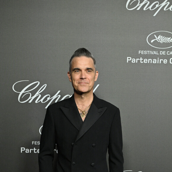 Robbie Williams au photocall de la soirée "Chopard Art Evening" à l'hôtel Martinez lors du 76ème Festival International du Film de Cannes, le 23 mai 2023. © Olivier Borde/Bestimage 