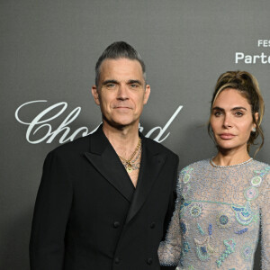 Robbie Williams et sa femme Ayda Field au photocall de la soirée "Chopard Art Evening" à l'hôtel Martinez lors du 76ème Festival International du Film de Cannes, le 23 mai 2023. © Olivier Borde/Bestimage 
