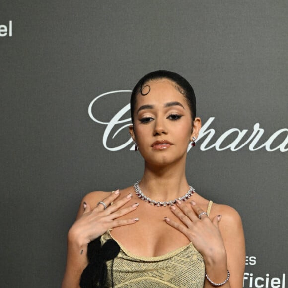 Léna Mahfouf a également fait parler d'elle dans une robe vintage qui a fait l'unanimité 
Léna Mahfouf (Léna Situations) au photocall de la soirée "Chopard Art Evening" à l'hôtel Martinez lors du 76ème Festival International du Film de Cannes, le 23 mai 2023. © Olivier Borde/Bestimage 