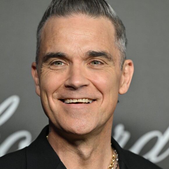 Robbie Williams au photocall de la soirée "Chopard Art Evening" à l'hôtel Martinez lors du 76ème Festival International du Film de Cannes, le 23 mai 2023. © Olivier Borde/Bestimage 