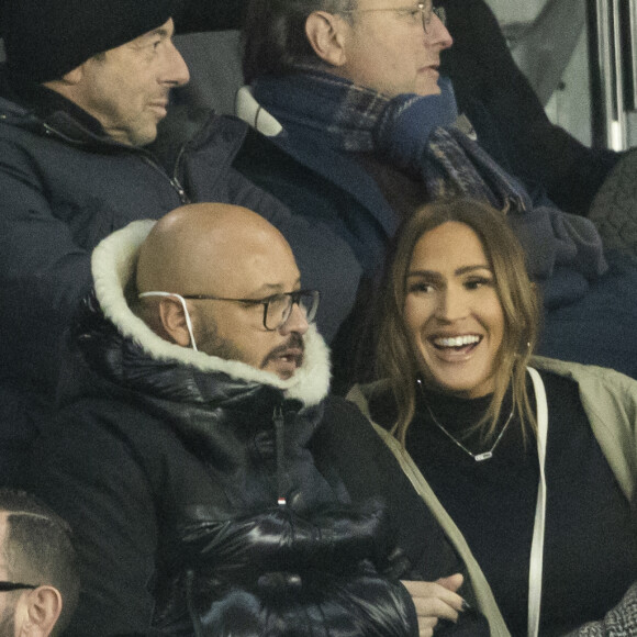 Vitaa (enceinte de son 3ème enfant) et son mari Hicham Bendaoud - People lors de la huitième de finale aller de la Ligue des champions entre le PSG et le Real Madrid au Parc des Princes à Paris le 15 février 2022. © Cyril Moreau/Bestimage