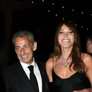 Carla Bruni et son mari Nicolas Sarkozy à la soirée "Women In Motion" par Kering au Château de la Castre lors du 75ème Festival International du Film de Cannes, le 22 mai 2022.