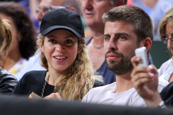 info du 4 juin 2022 - Gerard Piqué et la chanteuse Shakira officialisent leur séparation après douze ans de relation - Shakira enceinte et son compagnon Gerard Pique assistent au quart de finale de la coupe du monde de basket entre la Slovénie et les États-Unis à Barcelone en Espagne le 9 septembre 2014.