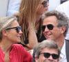Le couple est apparu souriant et radieux dans les tribunes, l'esprit libéré des tracas de la maladie dont a souffert l'homme d'affaires. 
Anne-Sophie Lapix et son mari Arthur Sadoun - Célébrités en tribunes des Internationaux de France de tennis de Roland Garros 2023 à Paris le 11 juin 2023. © Jacovides-Moreau/Bestimage