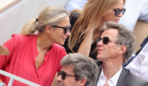 Anne-Sophie Lapix et son mari Arthur Sadoun - Célébrités en tribunes des Internationaux de France de tennis de Roland Garros 2023 à Paris le 11 juin 2023. © Jacovides-Moreau/Bestimage