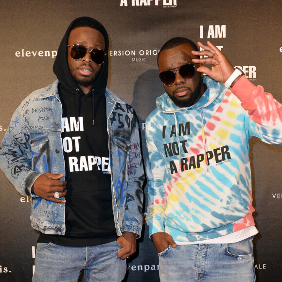 Le rappeur Gims (Maître Gims - Gandhi Djuna) et son frère Dadju (Dadju Djuna Nsungula) lors de la soirée de lancement de la collection capsule "I'm not a rapper" de la marque Elevenparis (Eleven Paris) à Paris, France, le 11 avril 2019. © Veeren/Bestimage