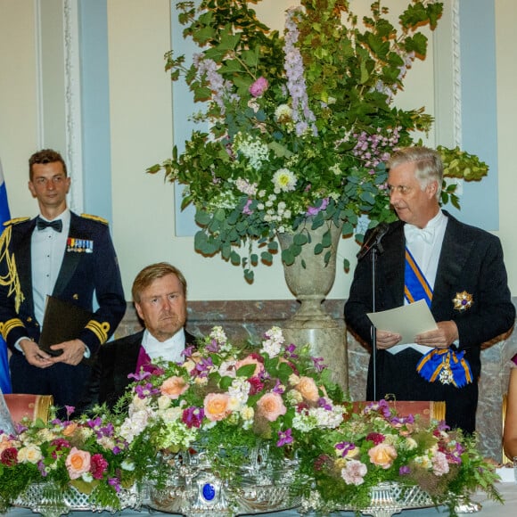 Le roi Willem-Alexander et la reine Maxima des Pays-Bas avec le roi Philippe et la reine Mathilde de Belgique lors du banquet d'état au chateau Laken à Bruxelles, le 20 juin 2023. 