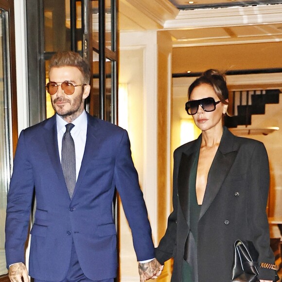 David Beckham et sa femme Victoria (Posh) à la sortie de leur hôtel à New York, le 11 octobre 2022. 