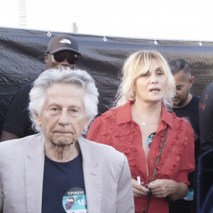 Roman Polanski et sa femme Emmanuelle Seigner - Les Rolling Stones en concert à l'hippodrome de Longchamp, dans le cadre de leur tournée anniversaire "Sixty", qui marque leurs 60 ans de carrière (1962-2022). Paris, le 23 juillet 2022. © Jack Tribeca / Bestimage.  Celebrities attend The Rolling Stones in concert at the Longchamp racecourse, as part of their "Sixty" anniversary tour, which marks their 60-year career (1962-2022). Paris, July 23, 2022. 