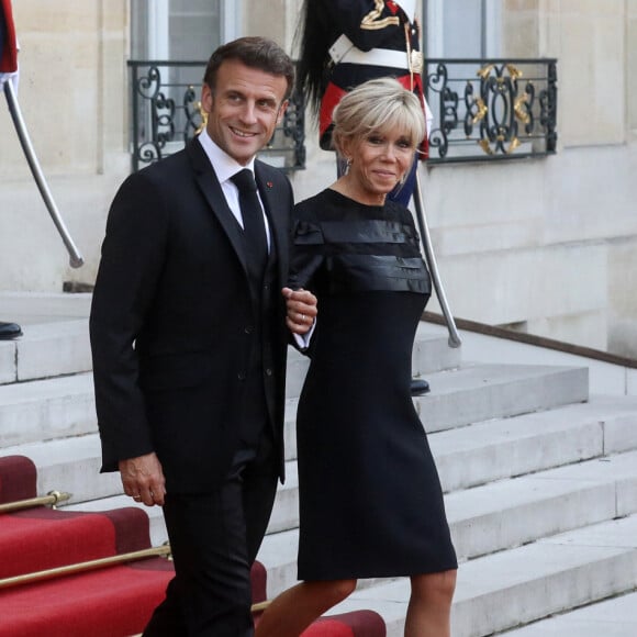 Le président français Emmanuel Macron et la première dame, Brigitte Macron lors d'un dîner officiel au palais de l'Élysée, en marge du sommet du nouveau pacte financier mondial, à Paris, le 22 juin 2023, au palais Brogniard, Paris. © Stéphane Lemouton / Bestimage 