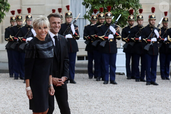 Le président français Emmanuel Macron et la première dame, Brigitte Macron lors d'un dîner officiel au palais de l'Élysée, en marge du sommet du nouveau pacte financier mondial, à Paris, le 22 juin 2023, au palais Brogniard, Paris. © Stéphane Lemouton / Bestimage 