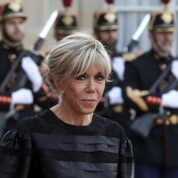Le président français Emmanuel Macron et la première dame, Brigitte Macron lors d'un dîner officiel au palais de l'Élysée, en marge du sommet du nouveau pacte financier mondial, à Paris, le 22 juin 2023, au palais Brogniard, Paris. © Stéphane Lemouton / Bestimage 