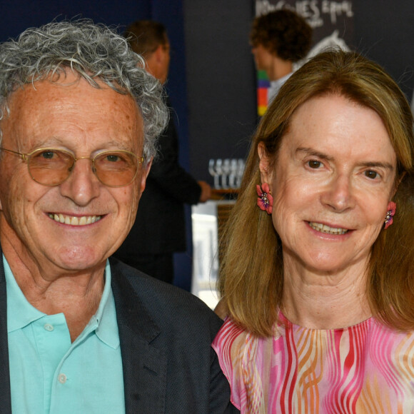 Exclusif - Nelson Monfort et Dominique Monfort dans l'Espace VIP lors de la 9ème édition du "Longines Paris Eiffel Jumping" au Champ de Mars à Paris, France, le 24 juin 2024. © Perusseau-Veeren/Bestimage 