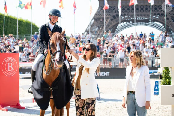 Penelope Leprevost sur GFE Candy de Nantuel (2eme) avec Mathilde Pinault et Virginie Coupérie-Eiffel lors de la remise du Prix Saint Laurent Eiffel Challenge lors de la 9ème édition du "Longines Paris Eiffel Jumping" au Champ de Mars à Paris, France, le 25 juin 2023. © Perusseau-Veeren/Bestimage 