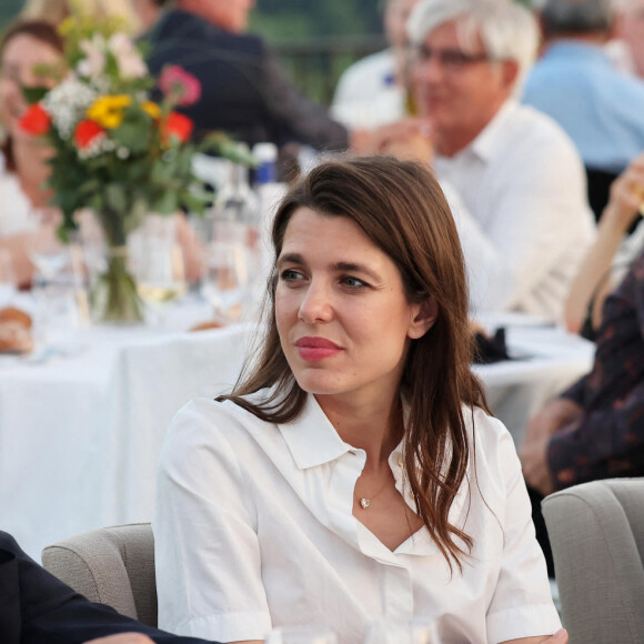 Exclusif - Hassen Chalghoumi, président de la conférence des imams de France et Charlotte Casiraghi lors de la soirée d'accueil des auteurs du 1er festival du livre Joséphine Baker au domaine Rochebois à Vitrac le 23 Juin 2023.  © Dominique Jacovides / Bestimage 