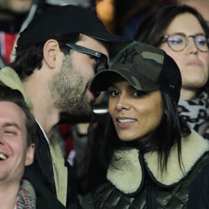La chanteuse Shy'm et son nouvel ami Keziah Derard - People dans les tribunes du match aller des 8èmes de finale de la ligue des champions entre le PSG et le Bayern Munich au Parc des Princes à Paris le 14 février 2023. 