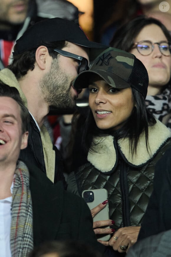 La chanteuse Shy'm et son nouvel ami Keziah Derard - People dans les tribunes du match aller des 8èmes de finale de la ligue des champions entre le PSG et le Bayern Munich au Parc des Princes à Paris le 14 février 2023. 