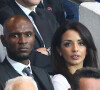 Hayet Abidal envoie un message fort après la mort de Naël
 
Eric Abidal et sa femme Hayet Kebir - People assistent au quart finale de la Ligue des Champions de football au Parc des Princes entre le PSG et le FC Barcelone à Paris.