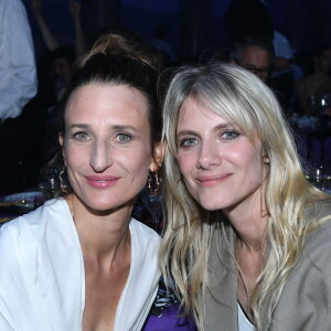 Camille Cottin, Mélanie Laurent - 20ème édition du dîner de la Mode du Sidaction, "Annees Palace" au Pavillon Cambon Capucines à Paris le 6 juillet 2023. Ce dîner signe la clôture des défilés de la Semaine de la Haute Couture à Paris. Cette édition sera l'occasion de célébrer les vingt ans de cet événement incontournable au profit de la lutte contre le sida. Le Chef Y. Alléno, chef trois étoiles au Guide Michelin, signe le menu de la 20ème édition de ce dîner de gala. Grâce à la mobilisation des personnalités de la mode, du cinéma et des médias, le Dîner de la mode avait permis de collecter 726 000 euros en faveur de la lutte contre le VIH/sida en 2022. Sidaction peut ainsi renforcer son action en faveur des programmes de recherche scientifique, médicale et de prévention du VIH et des associations d'aide aux personnes vivant avec le VIH en France et à l'international. Depuis 2003, le Dîner de la Mode a permis de collecter plus de onze millions d'euros. Plus que jamais, nous devons rester mobilisés pour faire reculer l'épidémie de VIH. © Rachid Bellak/Bestimage 