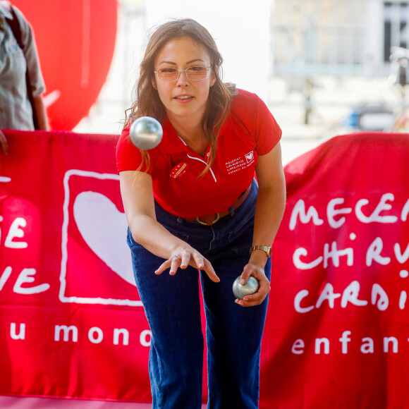 Exclusif - Dounia Coesens - Pétanque du coeur dans le cadre le la 20ème édition de "l'étape du coeur" de l'association "Mécénat Chirurgie Cardiaque" (MCC) lors du tour de France 2023 au Fan Club de Bordeaux, France, le 06 juillet 2023. © Christophe Clovis / Bestimage 