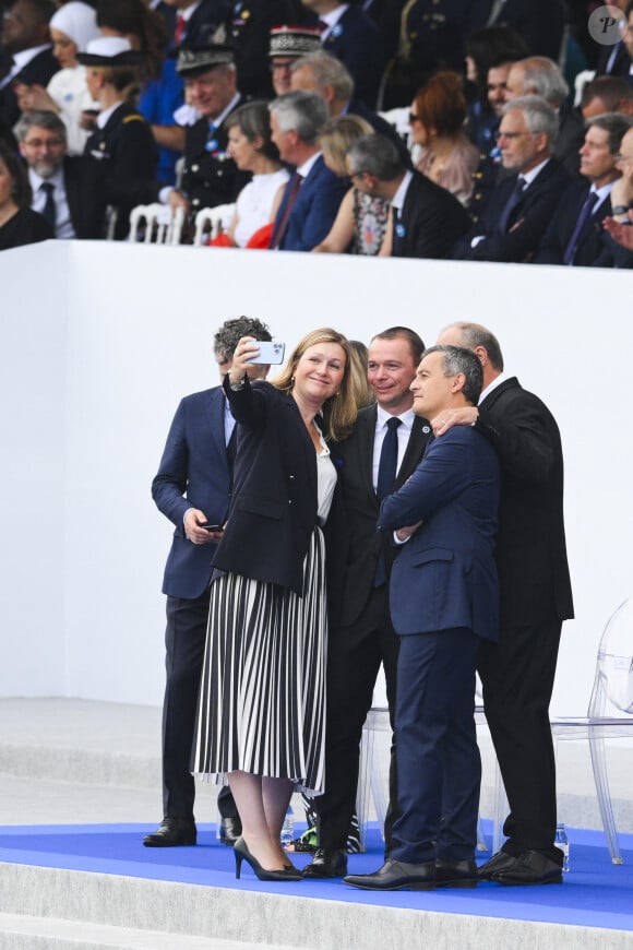 Yaël Braun Pivet - Présidente de l'Assemblée Nationale avec Olivier Dussopt, Ministre du Travail, Gérald Darmanin, Ministre de l'Intérieur et Eric Dupond-Moretti, Garde des Sceaux, ministre de la Justice lors de la cérémonie du 143ème défilé militaire du 14 juillet, jour de la Fête Nationale, sur les Champs-Elysées et la place de la Concorde, à Paris, France, le 14 juillet 2023. © Jean-Baptiste Autissier/Panoramic/Bestimage