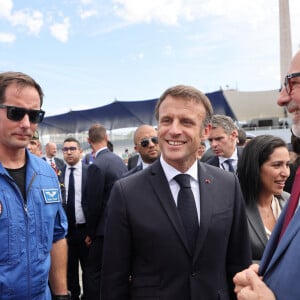 Thomas Pesquet et le Président de la République Emmanuel Macron lors d'un bain de foule après la cérémonie du 143ème défilé militaire du 14 juillet, jour de la Fête Nationale, sur les Champs-Elysées et la place de la Concorde, à Paris, France, le 14 juillet 2023. © Dominique Jacovides/Bestimage 