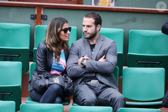 Ils sont en couple depuis leur rencontre en Afrique du Sud
Archives - Frédéric Michalak et sa compagne Cindy dans les tribunes du tournoi international de tennis Roland Garros à Paris. Le 31 mai 2010