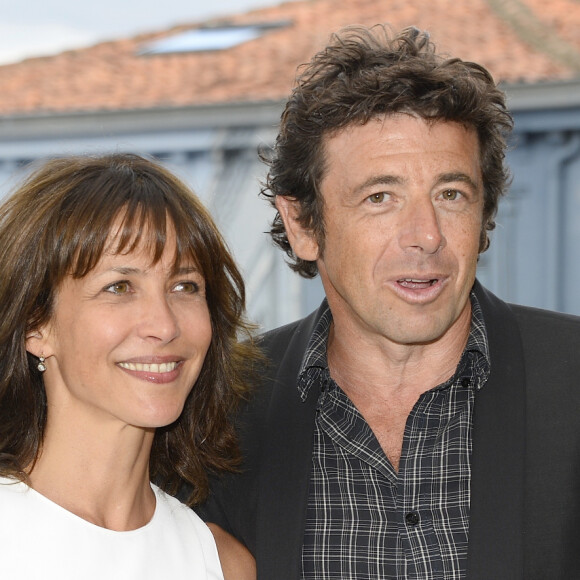 Sophie Marceau et Patrick Bruel - Photocall du film "Tu veux ou tu veux pas" lors de l'ouverture du 7ème Festival du Film Francophone d'Angoulême, le 22 août 2014.