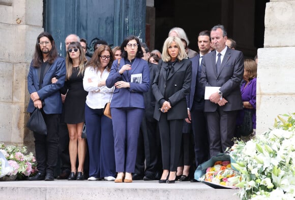 Lucien Gainsbourg (Lulu) et sa compagne, Rima Abdul-Malak, Brigitte Macron - Sorties des célébrités aux obsèques de Jane Birkin en l'église Saint-Roch à Paris. Le 24 juillet 2023 © Jacovides-KD Niko / Bestimage 