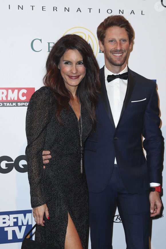 "Mon premier enfant a 10 ans aujourd'hui. 10 ans d'amour fou, et plus encore, puisque je l'aimais déjà avant qu'il ne vienne au monde !", a notamment écrit la journaliste.
Romain Grosjean et sa femme Marion Jolles au festival international de l'automobile à Paris le 28 janvier 2020. © Gwendoline Le Goff / Panoramic / Bestimage