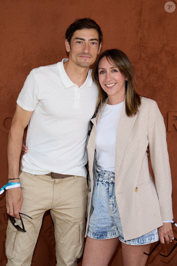 Claude Dartois et sa compagne Virginie Milano - Personnalités au Village lors des Internationaux de France de tennis de Roland Garros à Paris. Le 29 mai 2023 © Moreau-Jacovides / Bestimage