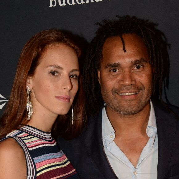 L'incroyable anniversaire de la fille de Christian Karembeu
 
Christian Karembeu et sa femme Jackie Chamoun - A l'occasion des 20 ans de la victoire de l'équipe de France, les Bleus se sont rendus à un dîner organisé au Buddha Bar avec tous les joueurs et leur famille. © Rachid Bellak/Bestimage