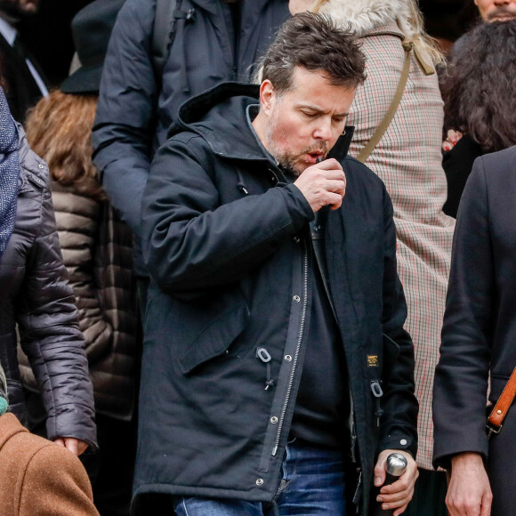 Ali Baddou et Nicolas Demorand - Obsèques de Sébastien Demorand à la Coupole du crématorium du cimetière du Père-Lachaise à Paris, France, le 31 janvier 2020. 