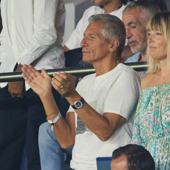 Grands fans de l'équipe de France, Nagui et Mélanie Page étaient présents pour ce match
 
Nagui et sa femme Mélanie Page dans les tribunes lors du match amical - France - Irlande (2-0) lors des matchs qualificatifs à l'Euro 2024 au Parc des Prince à Paris le 7 septembre 2023. © Cyril Moreau/Bestimage