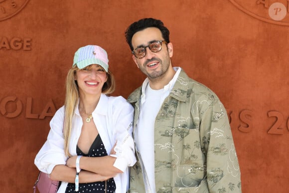 Jonathan Cohen et sa compagne Giulietta Canzani Mora Dj Piu Piu au village lors des internationaux de France Roland Garros à Paris le 13 juin 2021. © Dominique Jacovides / Bestimage