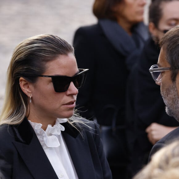 Sophie Tapie et Stéphane Tapie - Sorties de la messe funéraire en hommage à Bernard Tapie en l'église Saint-Germain-des-Prés à Paris. Le 6 octobre 2021 © Jacovides-Moreau / Bestimage