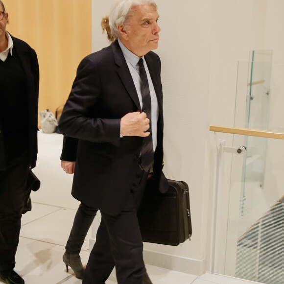 Exclusif - Bernard Tapie - B.Tapie à la sortie de la 11ème chambre correctionnelle, 2ème section du tribunal de Paris accompagné de ses avocats H.Témime et J.Minkowski à Paris, France, le 1er avril 2019. Le ministère public a requis 5 ans ferme pour Tapie et 3 ans pour S.Richard dont 18 mois avec sursis et interdiction d'exercer toute fonction publique pendant 5 ans. B.Tapie et le PDG d'Orange, S.Richard, seront les prévenus du procès pénal de l'arbitrage rendu en 2008 en faveur de l'ancien homme d'affaires, dans son contentieux avec le Crédit lyonnais sur la vente du fabricant d'équipements de sport allemand Adidas en 1993, qui s'est ouvert le 11 mars 2019. L'homme d'affaires et patron du groupe de médias "La Provence", qui lutte à 76 ans contre un cancer de l'estomac, n'a fait aucune déclaration à son arrivée au tribunal. Après dix ans de péripéties judiciaires, B.Tapie, est jugé pour escroquerie et détournement de fonds publics; S.Richard, 57 ans, qui était alors directeur de cabinet de la ministre de l'Economie C.Lagarde, pour complicité. © CVS/Bestimage