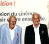 Les deux acteurs s'étaient rencontrés très jeunes, en 1948, dans un club de boxe nommé l'Avia Club.
Charles Gérard et Jean-Paul Belmondo au photocall de la cérémonie d'ouverture de la 10ème édition du Festival Lumière à Lyon, le 13 octobre 2018. © Dominique Jacovides/Bestimage