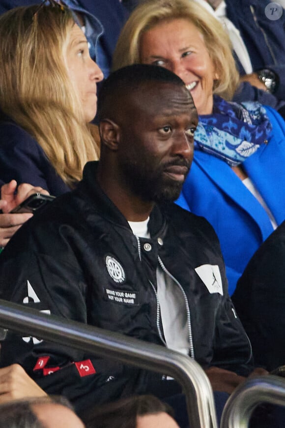 Thomas Ngijol - Tribunes du match de Ligue des champions entre le PSG et le Borussia Dortmund (2-0) au Parc des Princes à Paris, le 19 septembre 2023. © Cyril Moreau/Bestimage