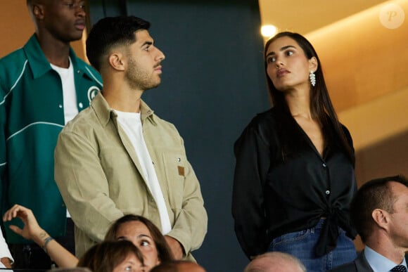 Marco Asensio et sa compagne Sandra Garal - Tribunes du match de Ligue des champions entre le PSG et le Borussia Dortmund (2-0) au Parc des Princes à Paris, le 19 septembre 2023. © Cyril Moreau/Bestimage