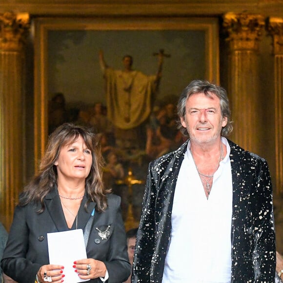 Jean-Luc Reichmann et sa femme Nathalie Lecoultre - Mariage d'Hugues Aufray et de Murielle Mégevand à l'église Saint-Vigor de Marly-Le Roy, France, le 2 septembre 2023.