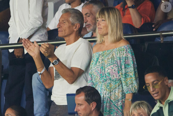 Nagui et sa femme Mélanie Page dans les tribunes lors du match amical - France - Irlande (2-0) lors des matchs qualificatifs à l'Euro 2024 au Parc des Prince à Paris, le 7 septembre 2023.